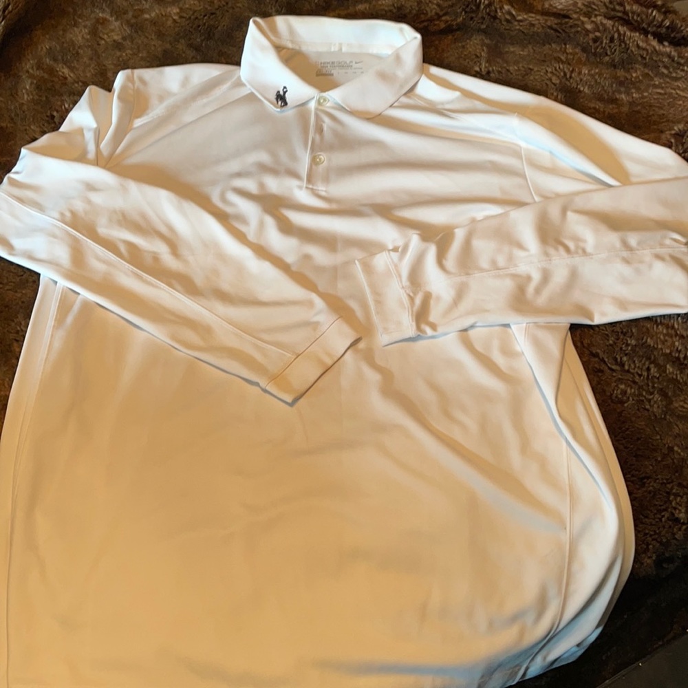Men’s white Nike golf polo with Wyoming cowboy embroidery